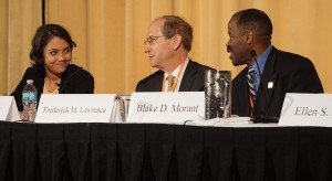 Natalie Kitroeff (left), Frederick Lawrence (middle), and Blake Morant (right) speaking at a panel.