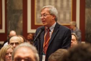 Erwin Chemerinsky stands behind a microphone