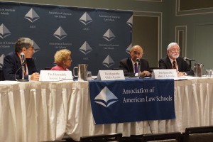 Judges Jeremy Fogel, Gladys Kessler, Harry Edwards, and Jed Rakoff sit behind a panel table for the AALS/National Academy of Sciences joint program