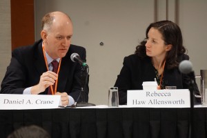 A man and woman seated at the Antitrust and State panel at the 2016 Annual Meeting