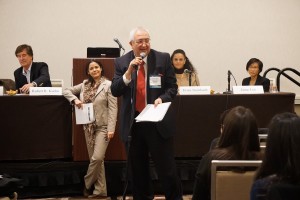 Robert R. Kuehn, Washington University in St. Louis School of Law, Luz E. Herrera, University of California, Los Angeles School of Law, Tirien Steinbach, University of California, Berkeley School of Law, and Jaime Lee, University of Baltimore School of Law watch audience member speaking at a Clinical session at the 2016 Annual Meeting