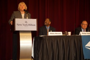 2016 AALS President Kellye Y. Testy at the 2016 AALS Annual Meeting next to Blake Morant
