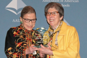 Justice Ruth Bader Ginsburg presents the Section’s Lifetime Achievement Award to Herma Hill Kay at the 2015 AALS Annual Meeting.